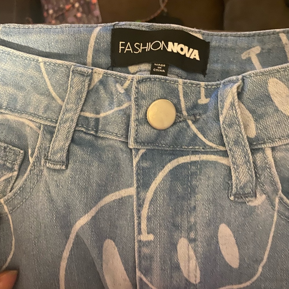 Fashion Nove smiley face jeans never worn size 0
